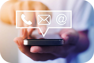 Person using a smartphone with phone and email contact icons